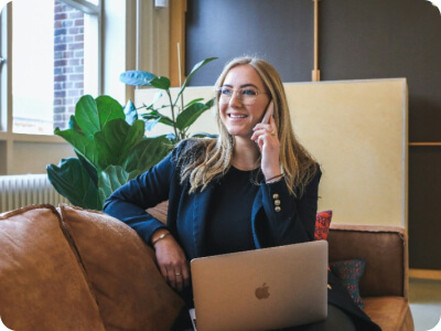 A woman is talking on the phone